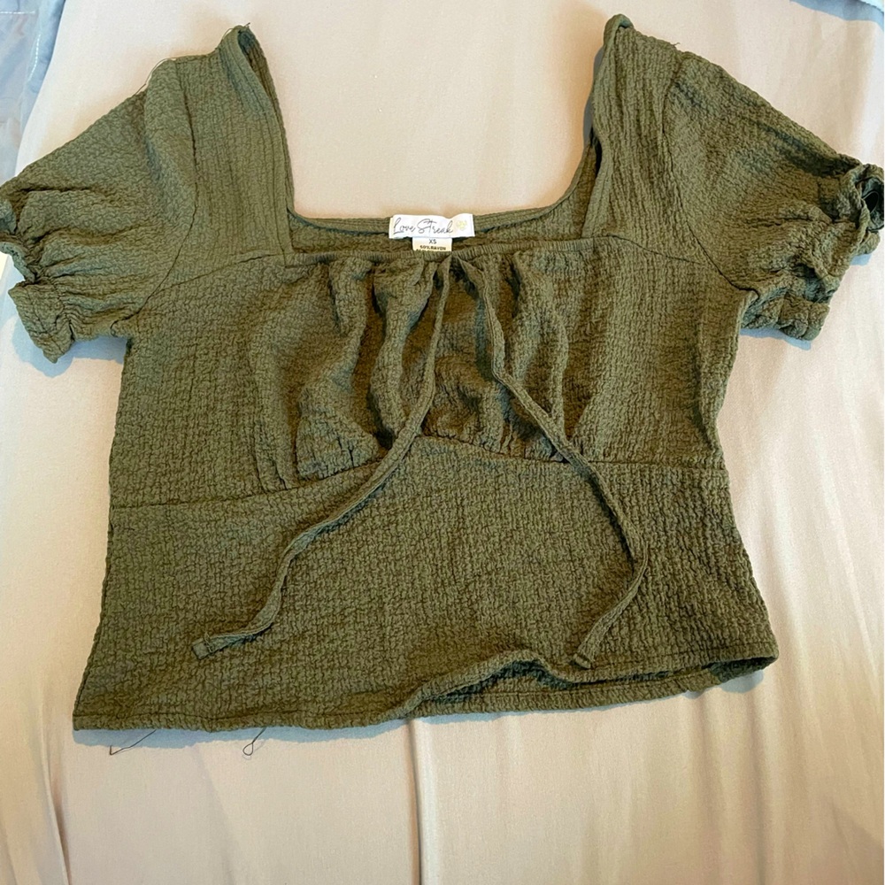 Brand: Love Steal green crop top